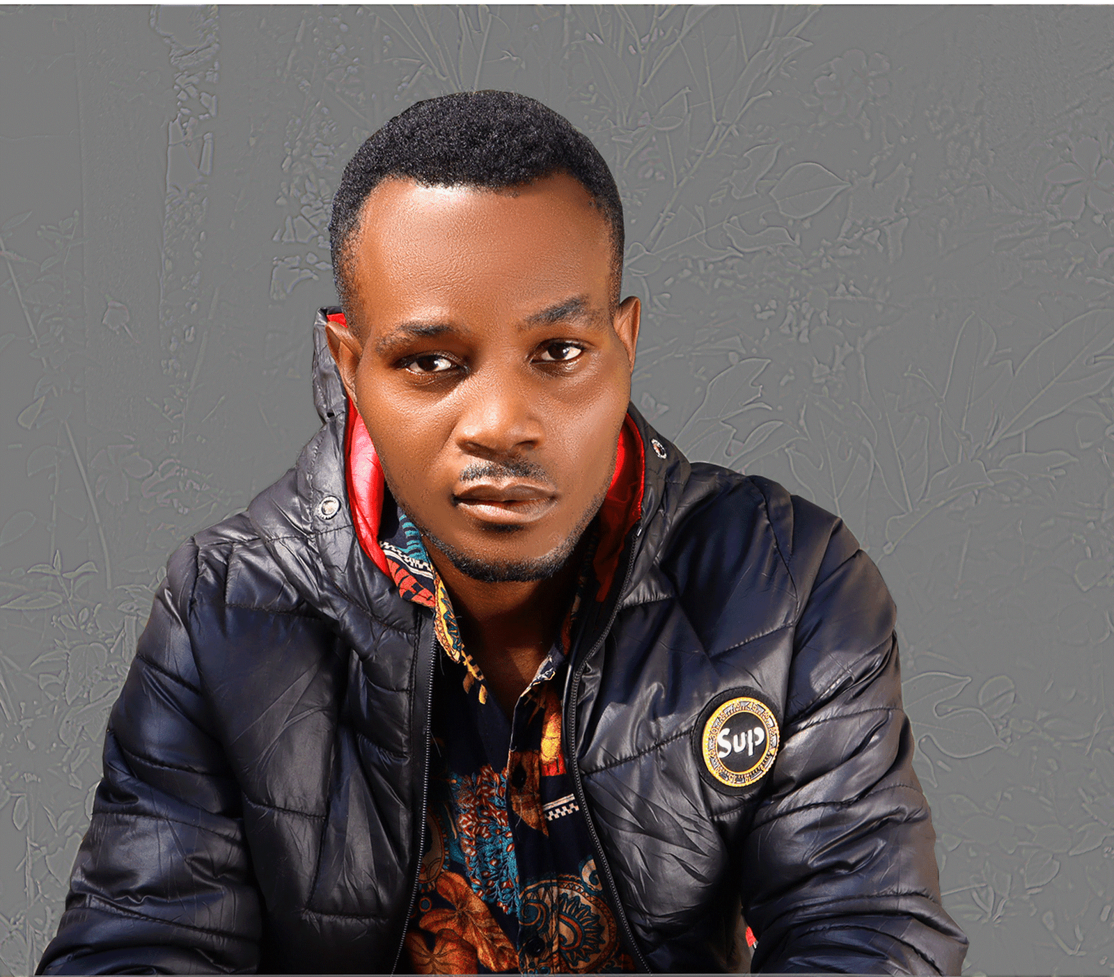 Let introduce you to Uganda’s renown song writer and music critic, Zeddie Magic Facts.
